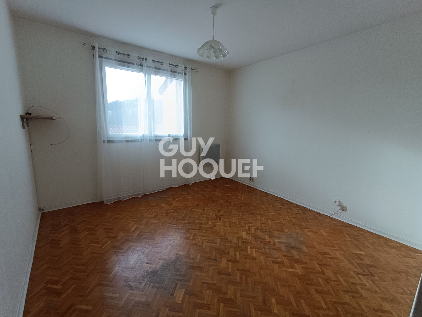 Appartement 3 pièces de 71 m² avec terrasse, garage et cave