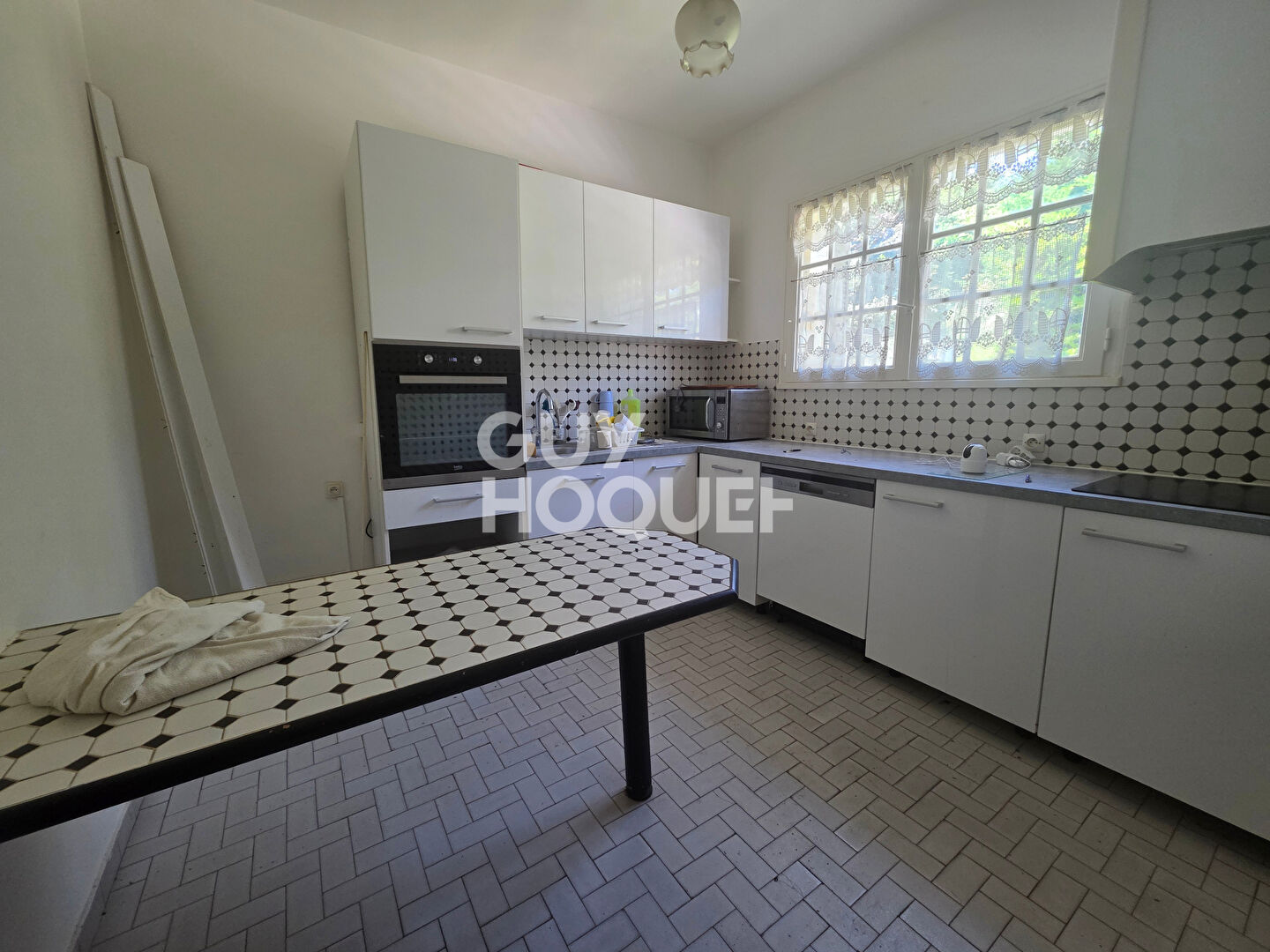 Maison 130 m² - sous-sol total - garage - grand jardin