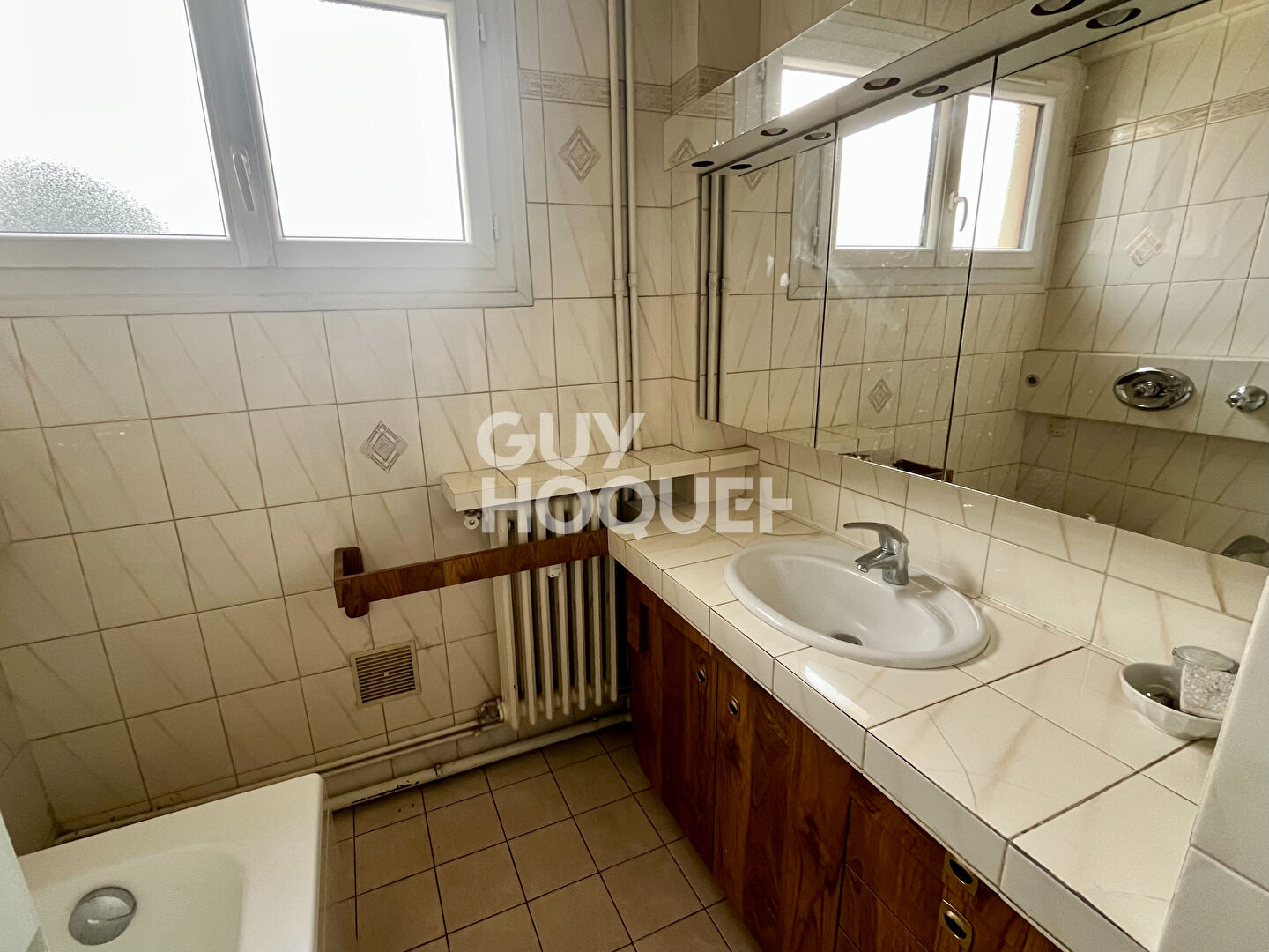 Appartement 3 pièces lumineux avec véranda, garage ? Proche RER E et centre-ville