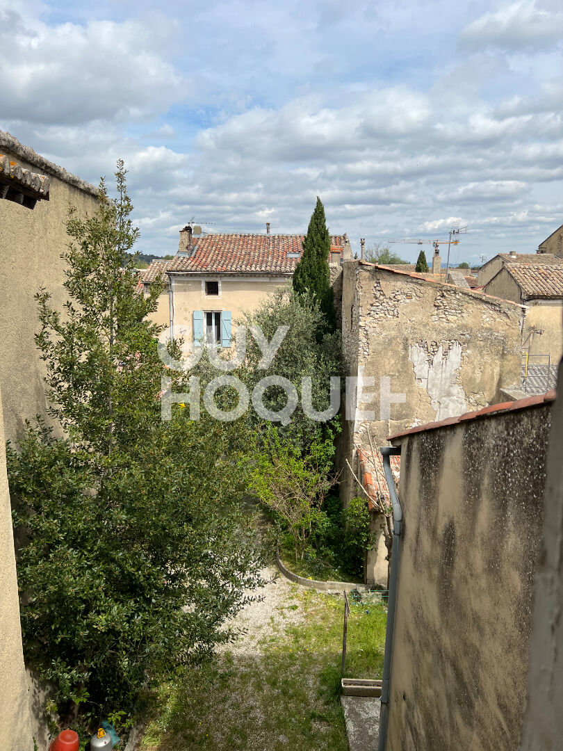bâtiment ancien de 400 m² plein coeur de ville à restaurer