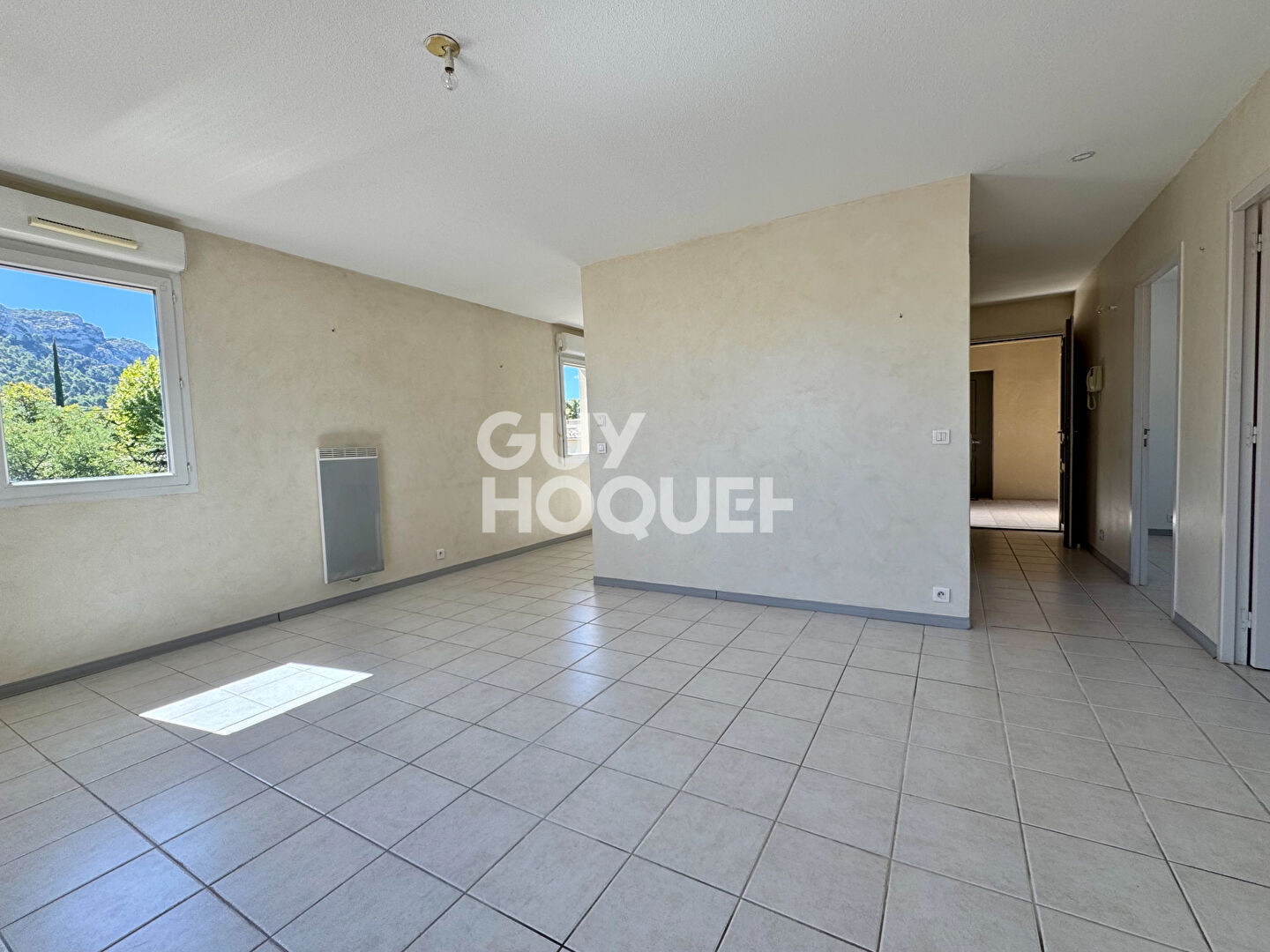 Appartement T3 avec terrasse place de parking et garage