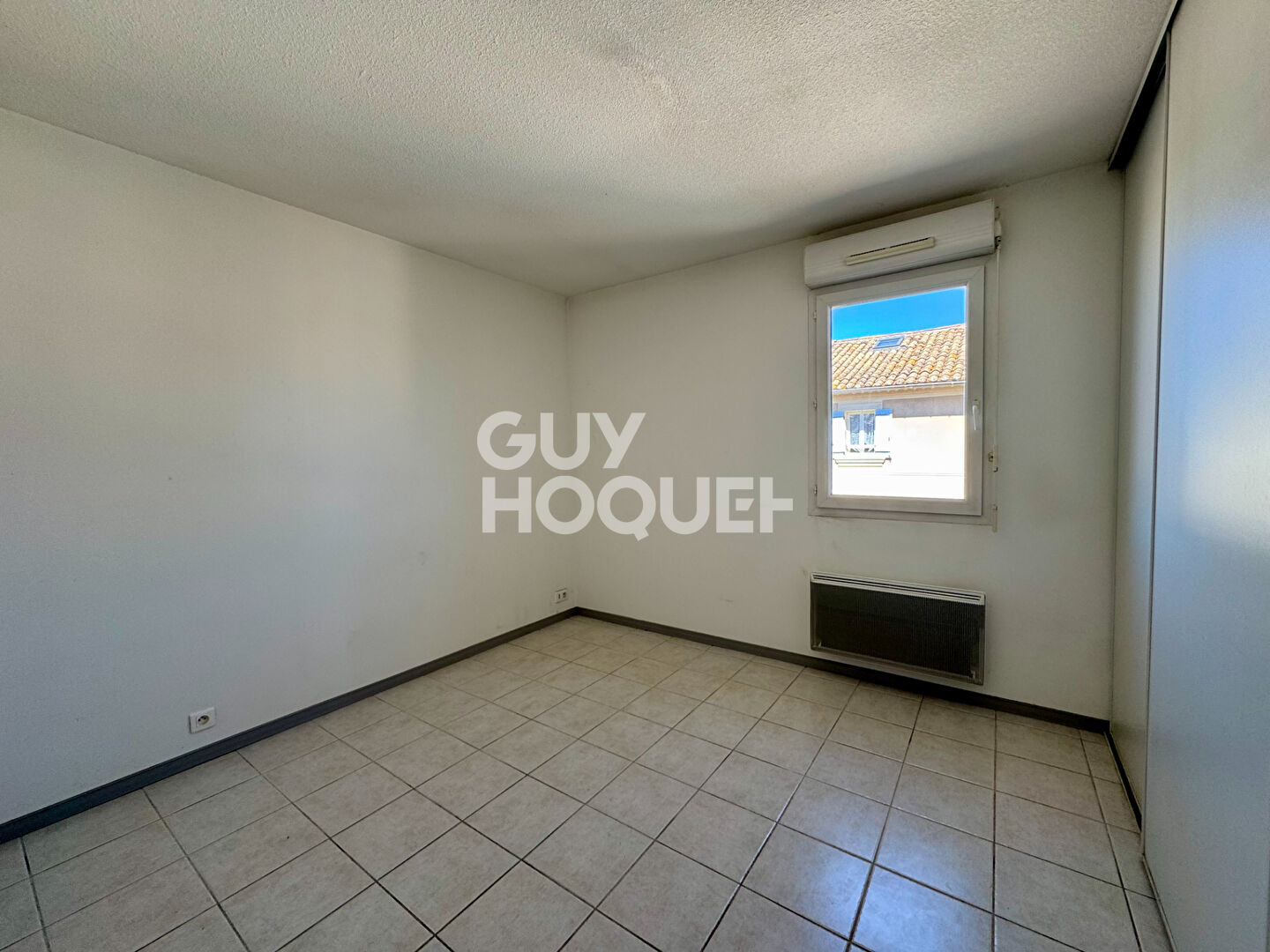 Appartement T3 avec terrasse place de parking et garage