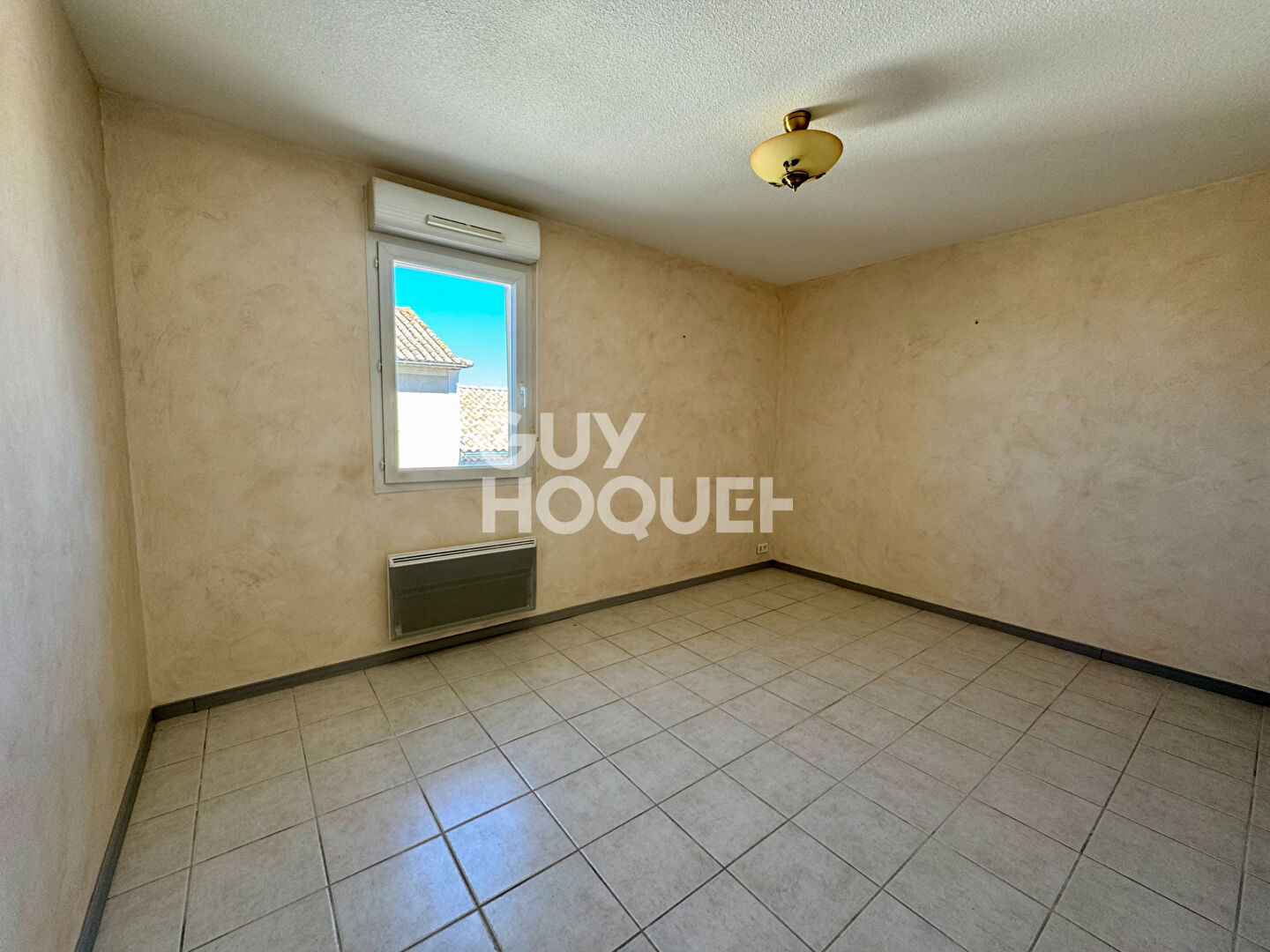 Appartement T3 avec terrasse place de parking et garage