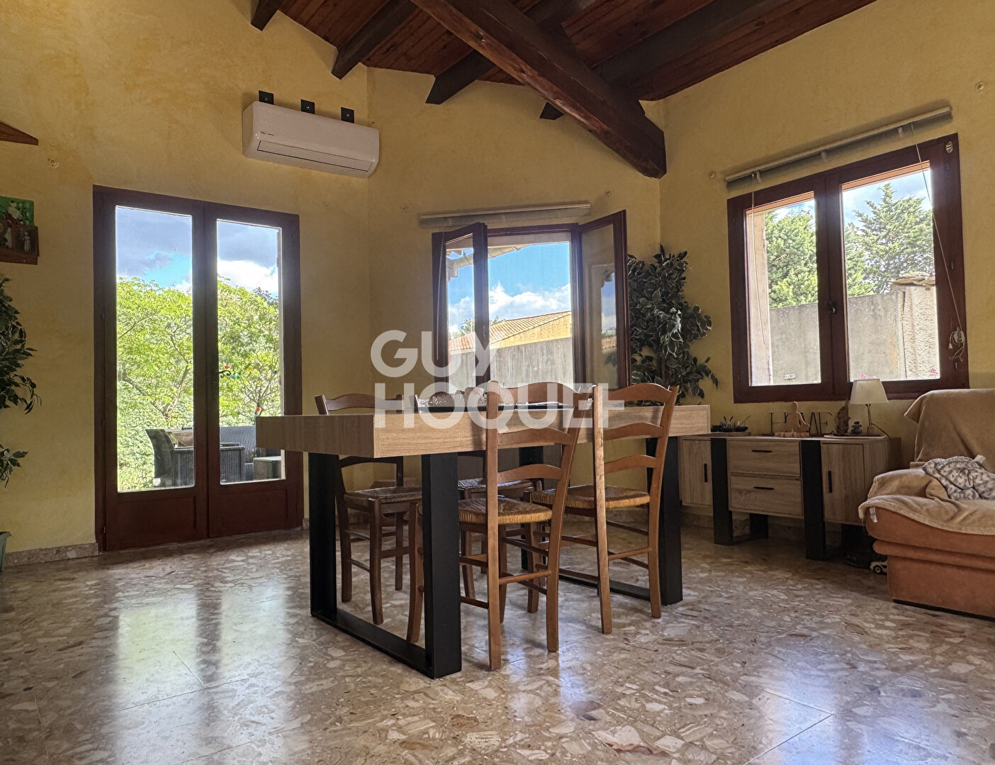 Appartement de plain pied de 115m² avec garage et terrain 250m²