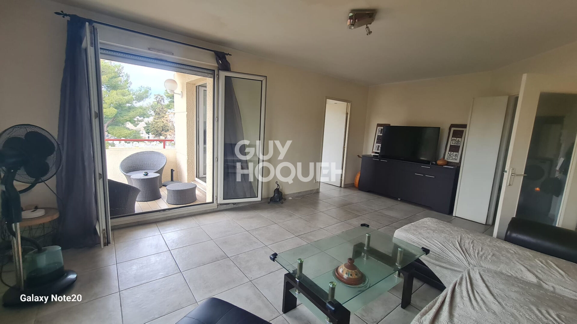 Appartement T4 avec terrasse, box fermé et parking privé