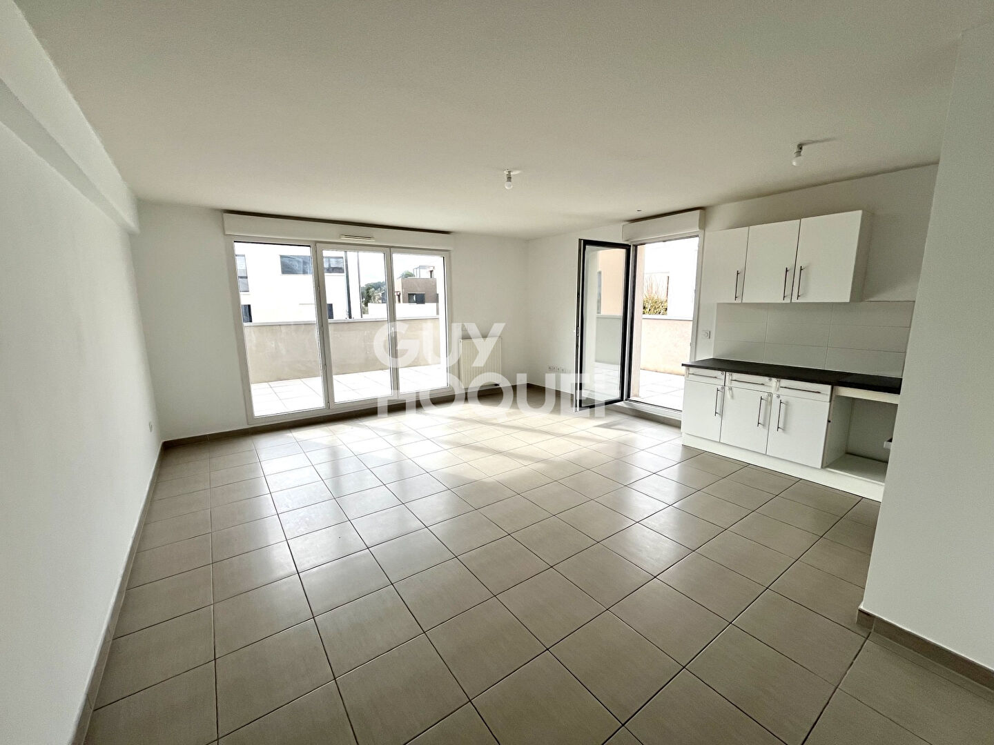 Centre ville : T4 85m² + terrasse 60m2 + box + parking