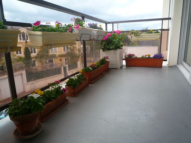 5 pièces/4 chambres - en centre ville - balcon - garage+parking