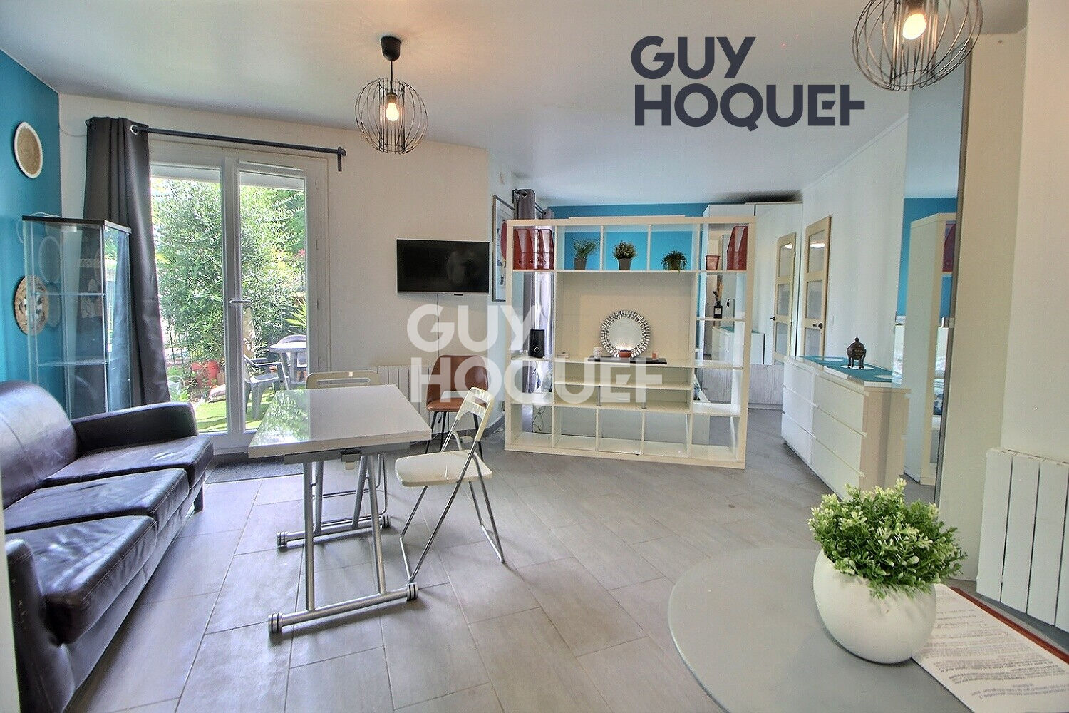 Grand studio en rez-de-jardin