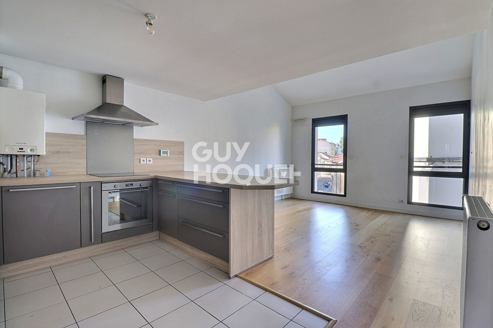 Appartement T3bis avec mezzanine et balcon - Quartier Saint-Louis