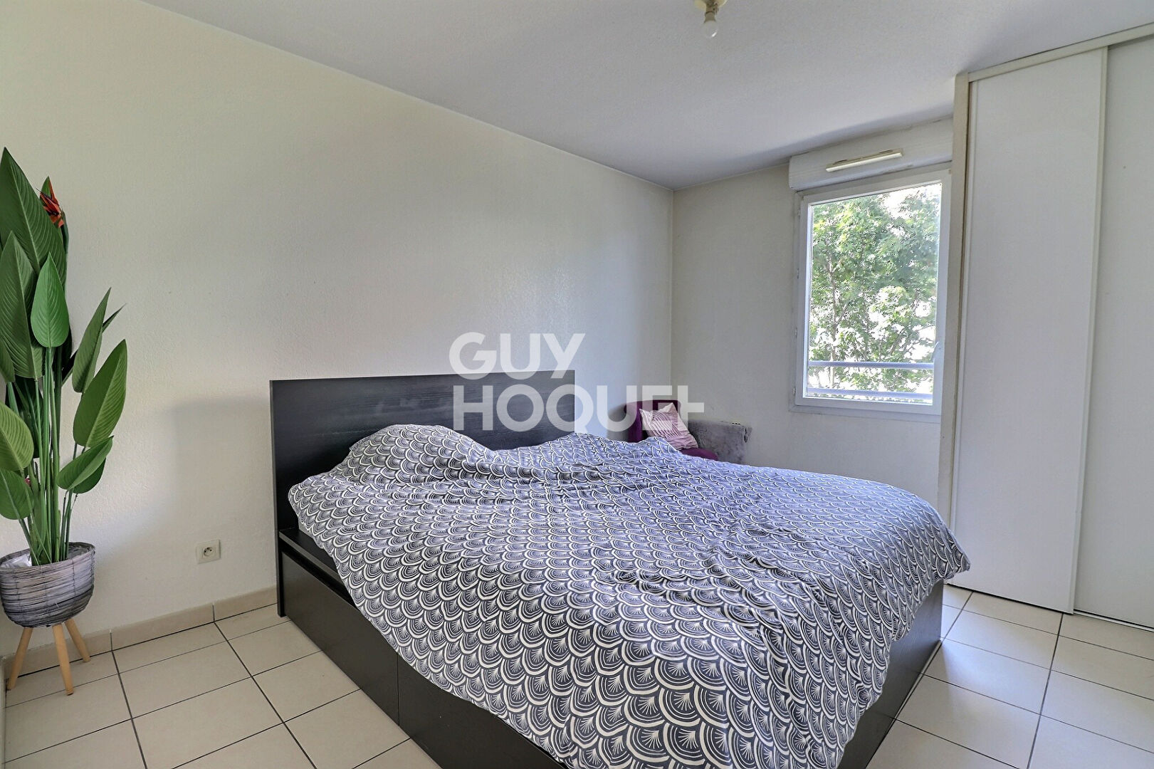 T3 vendu loué avec balcon et place de parking - Proximité Grand Parilly