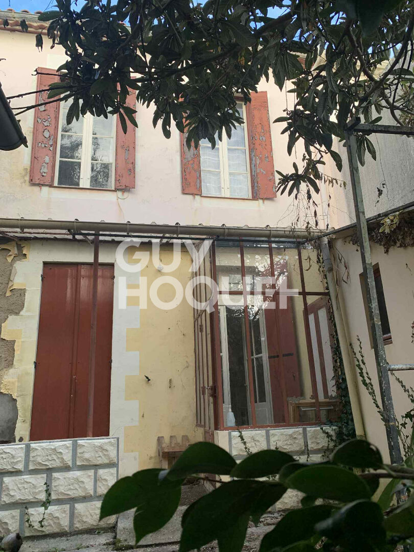 Maison de ville à faire revivre