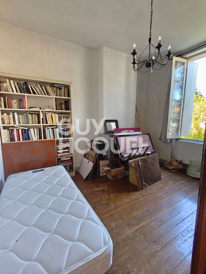 Maison de ville à faire revivre