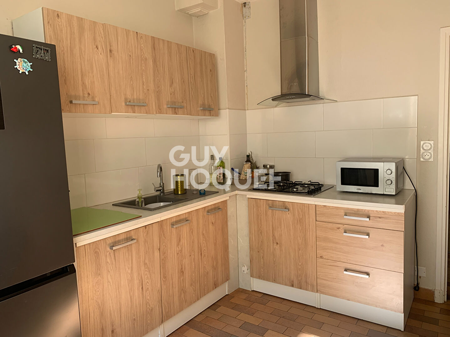 Maison divisée en 2 appartements