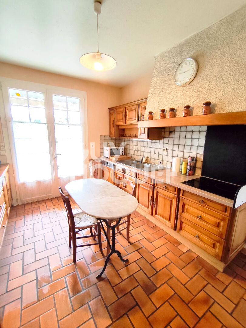 Pavillon confortable sur terrain clos de 1 000 m²