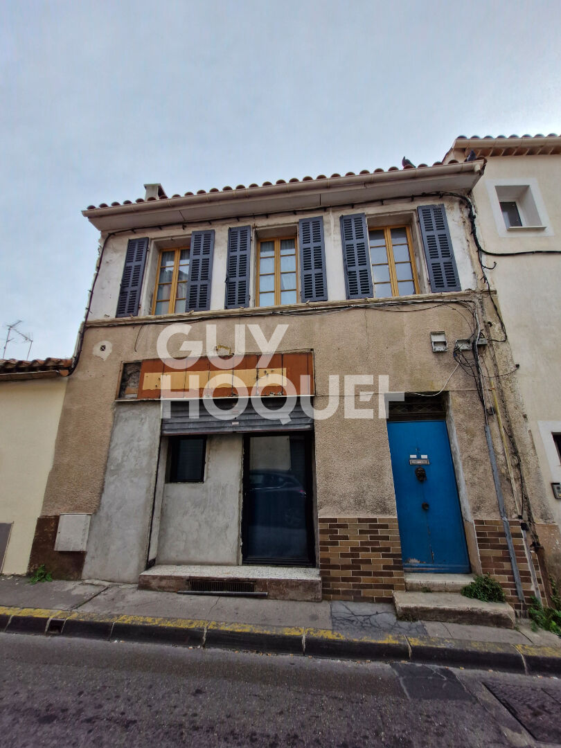 Immeuble 222 m2 avec multiples espaces habitables et terrasse