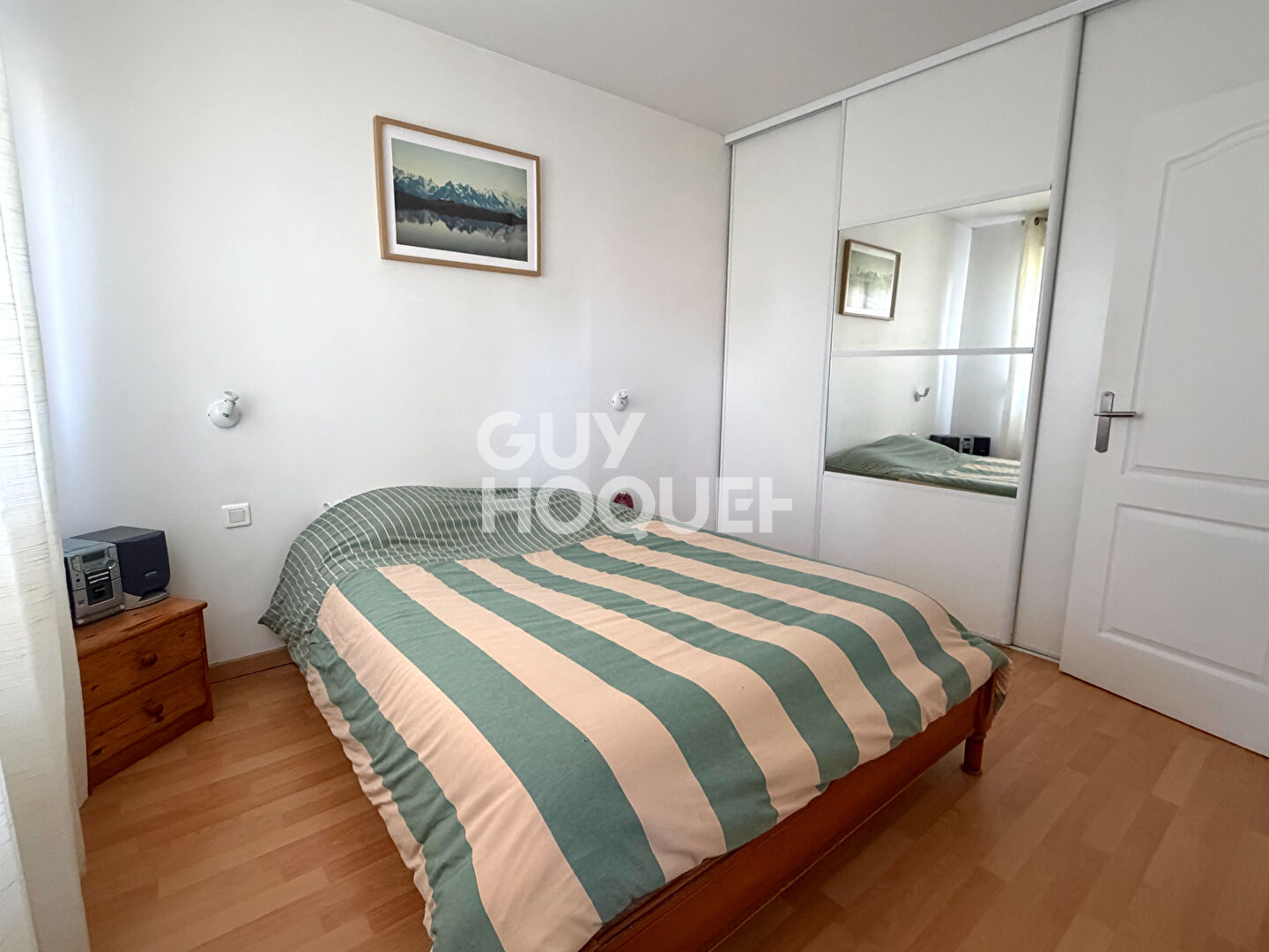 Appartement au Coudray-Montceaux avec box et place de parking