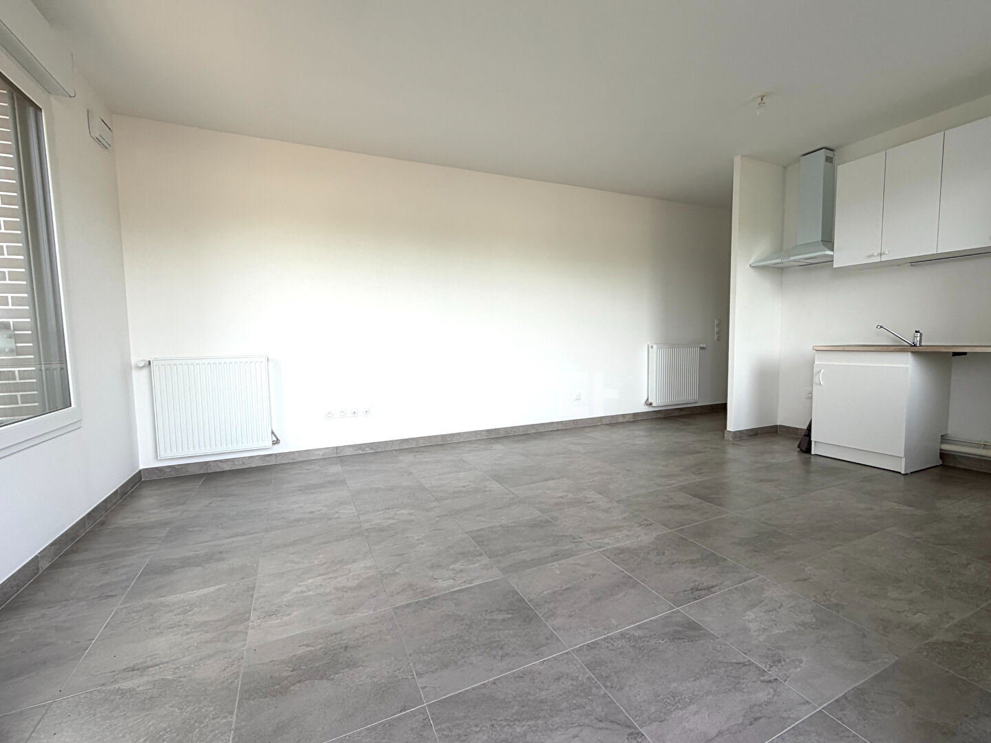 Appartement à Mennecy et 2 places de parking