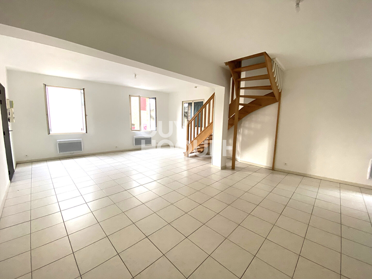 LOCATION d'un appartement 4 pièces (92 m²) à BEAUMONT DE LOMAGNE