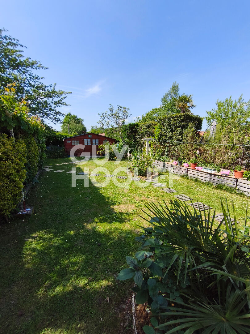 Maison avec deux logements, 4 chambres de 140 m² et garage