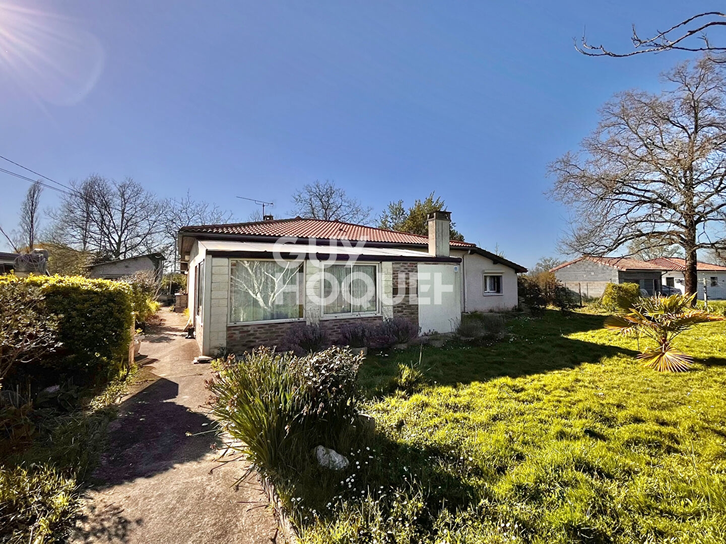 Maison de plain-pied de 115 m2, 4 chambres, un garage