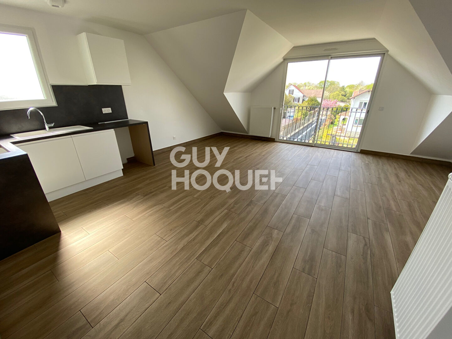 Exclusivité GUY HOQUET  DE MORET : Bel appartement de 41 m2 (58 m2 au sol) au 2nd Etage d'un immeuble construit en 2021
