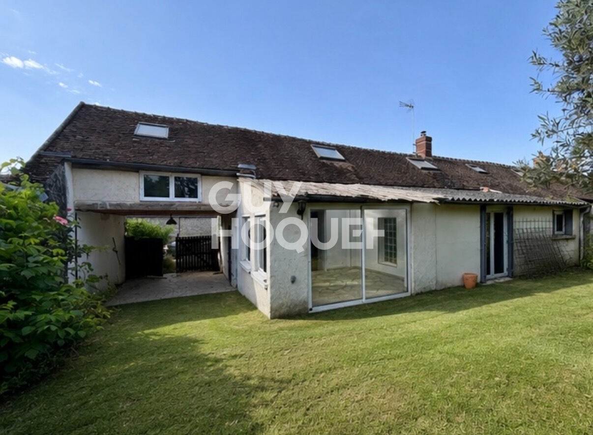 Maison  4 pièces de  130 m2 sur un terrain de 1168m²  avec une grange