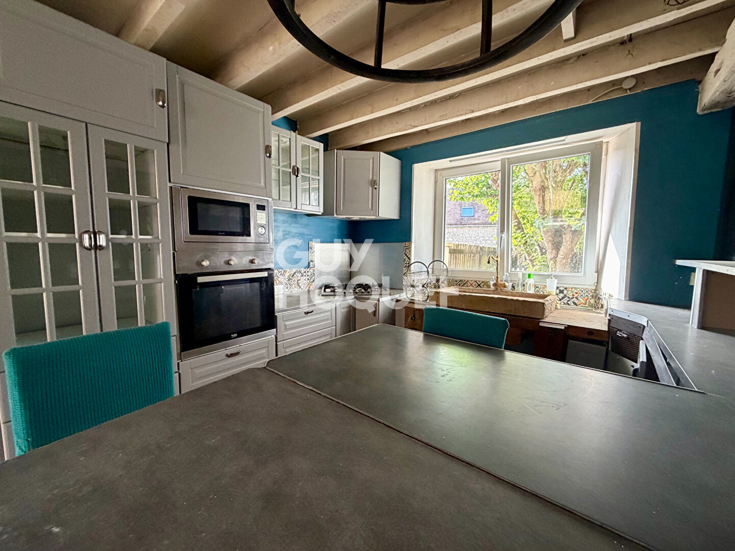 Maison  4 pièces de  130 m2 sur un terrain de 1168m²  avec une grange