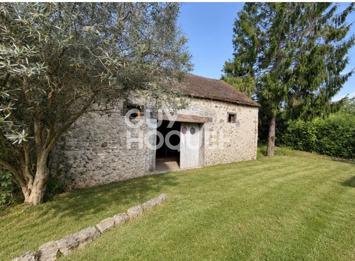 Maison  4 pièces de  130 m2 sur un terrain de 1168m²  avec une grange