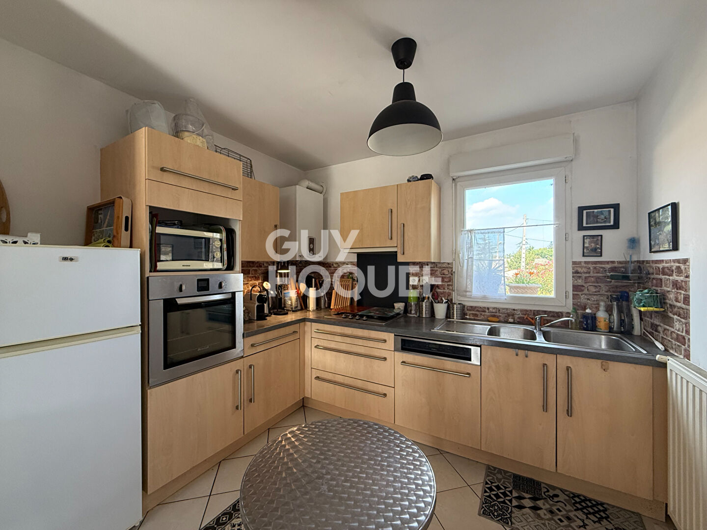 Maison mitoyenne récente  avec jardin à GIVORS centre