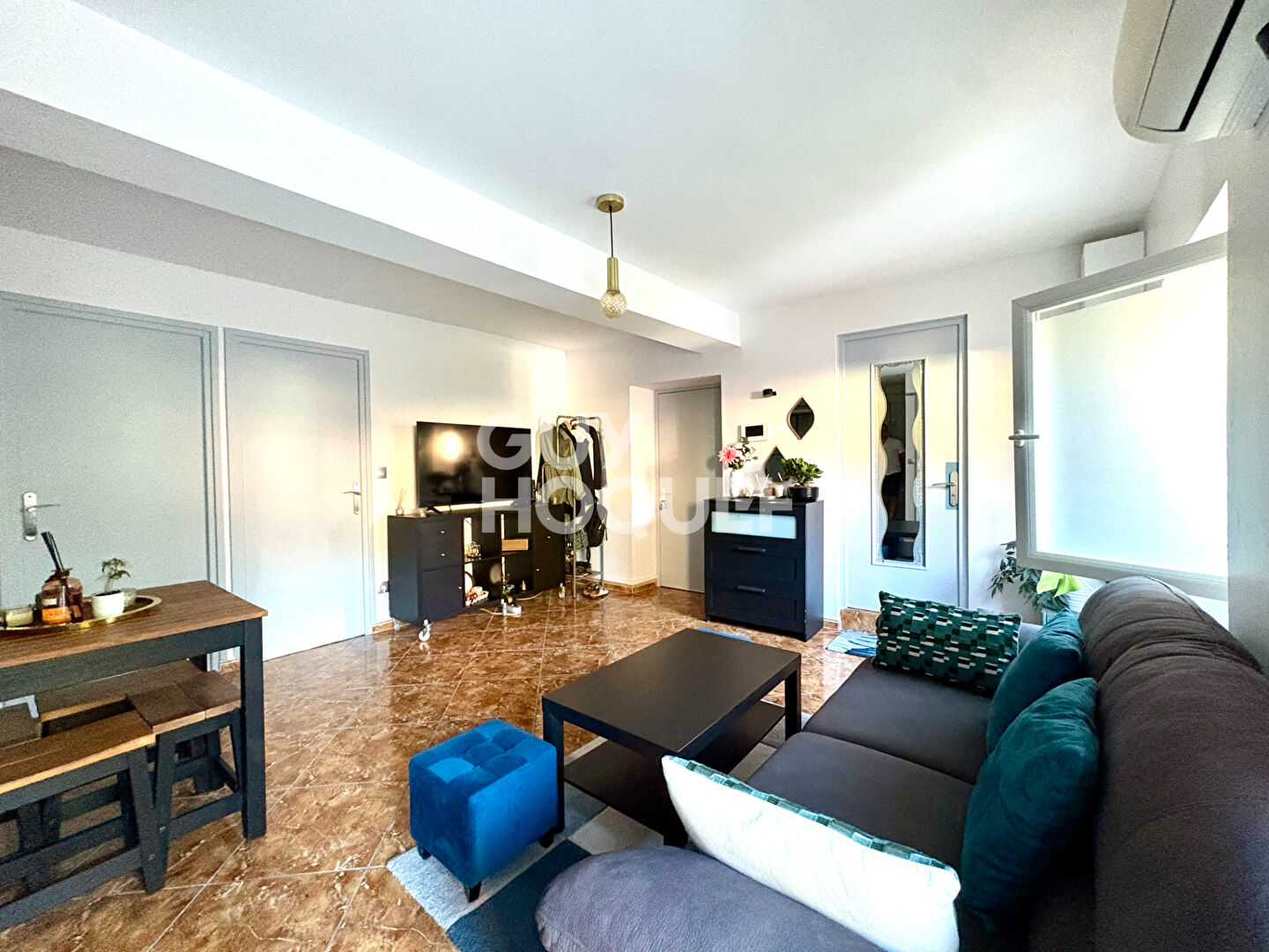 Coquet appartement de type T3 avec une belle terrasse de plus de 15 m² et une cave