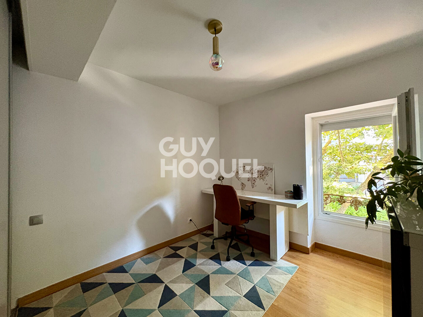 Coquet appartement de type T3 avec une belle terrasse de plus de 15 m² et une cave