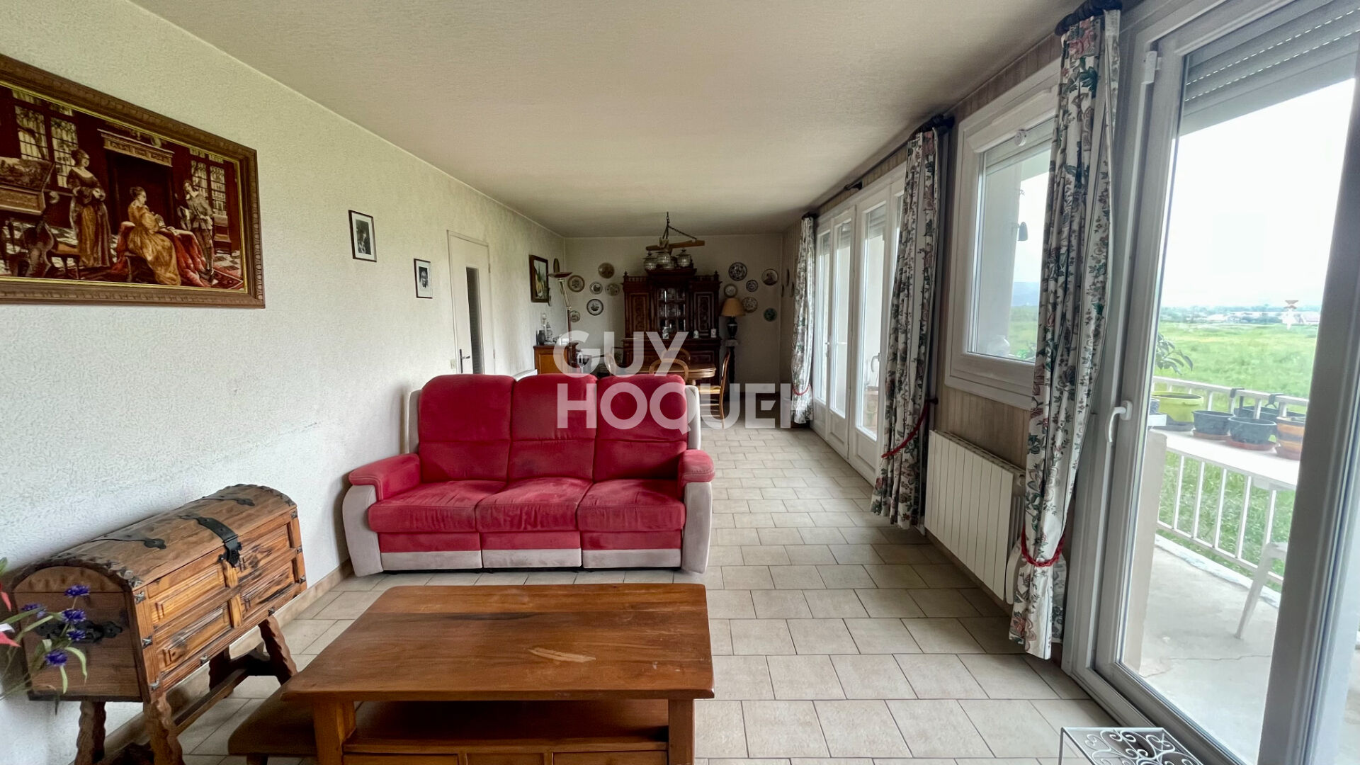 Appartement de type 5 de 110 m² avec balcons, cave et garage à GRINGY (69520)