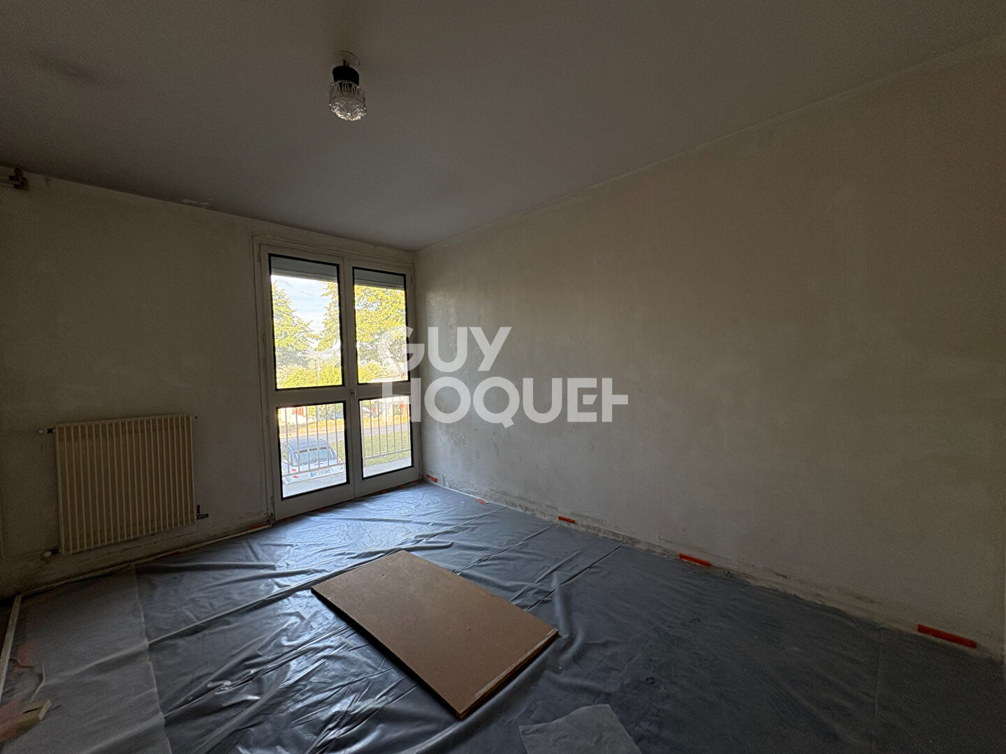 Spacieux T5 à rénover de 105,51 m² avec balcons et cave