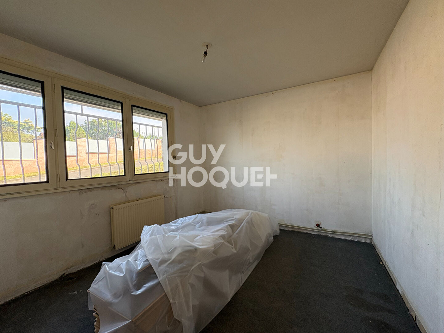 Spacieux T5 à rénover de 105,51 m² avec balcons et cave