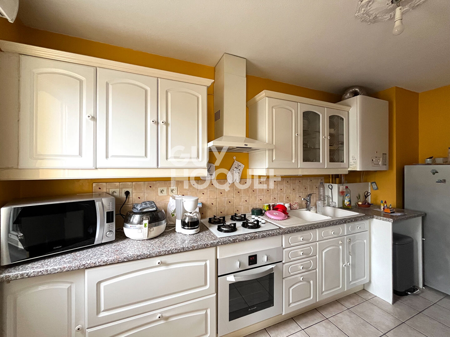 Spacieux T4 avec balcon, garage et grenier / Proche gare de Givors Ville