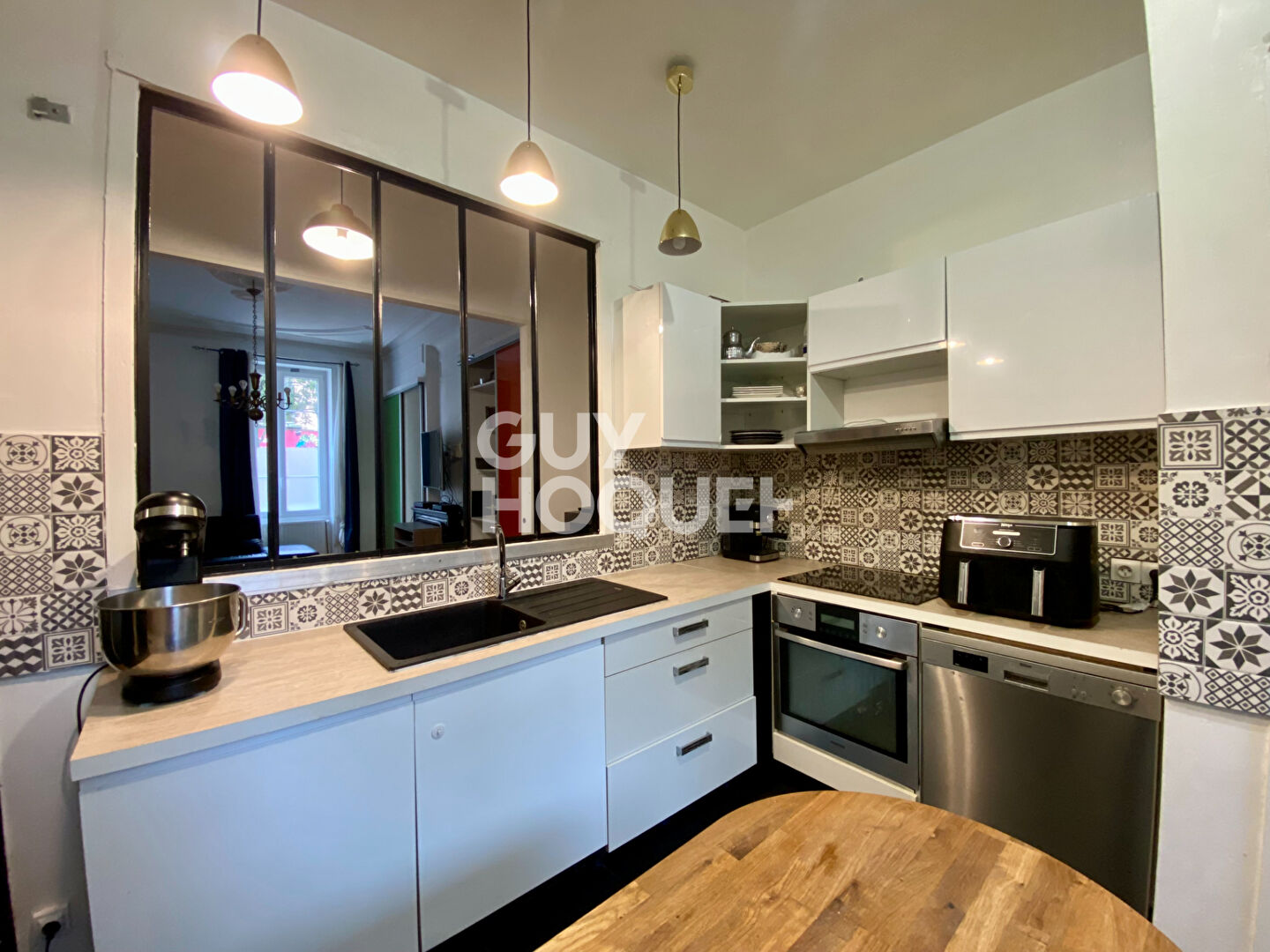 Appartement T4 traversant en rez-de-chaussée avec grande terrasse dans le centre-ville de Givors