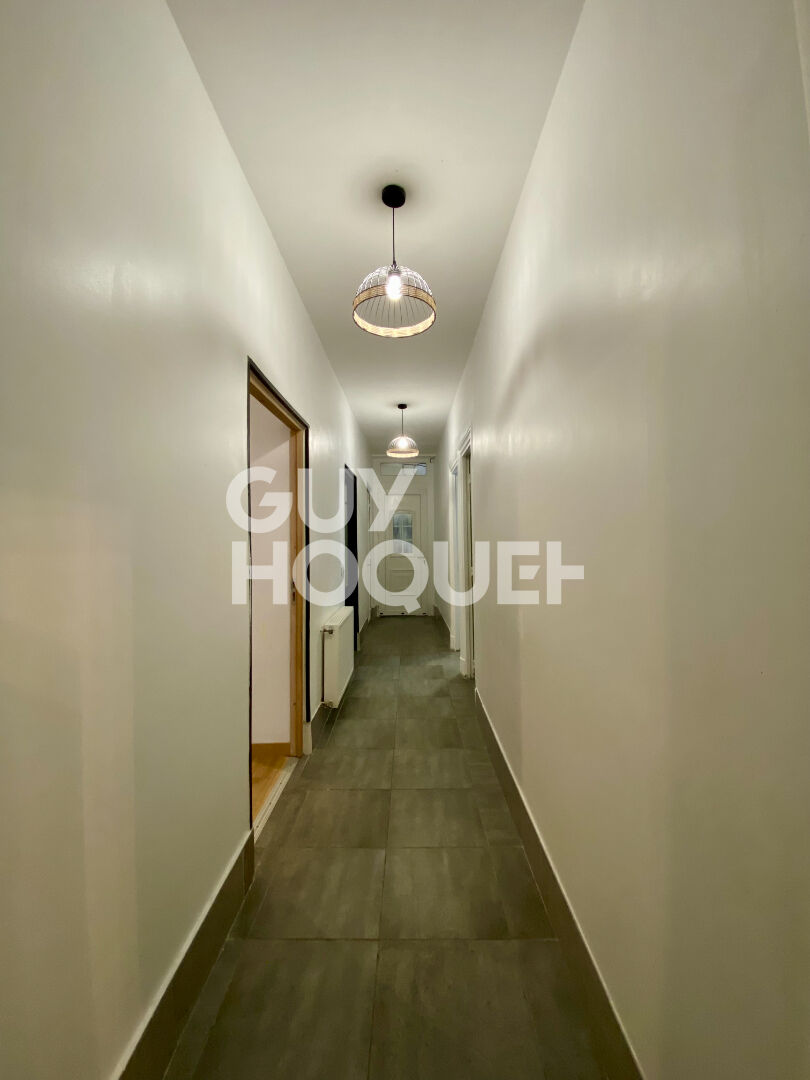 Appartement T4 traversant en rez-de-chaussée avec grande terrasse dans le centre-ville de Givors