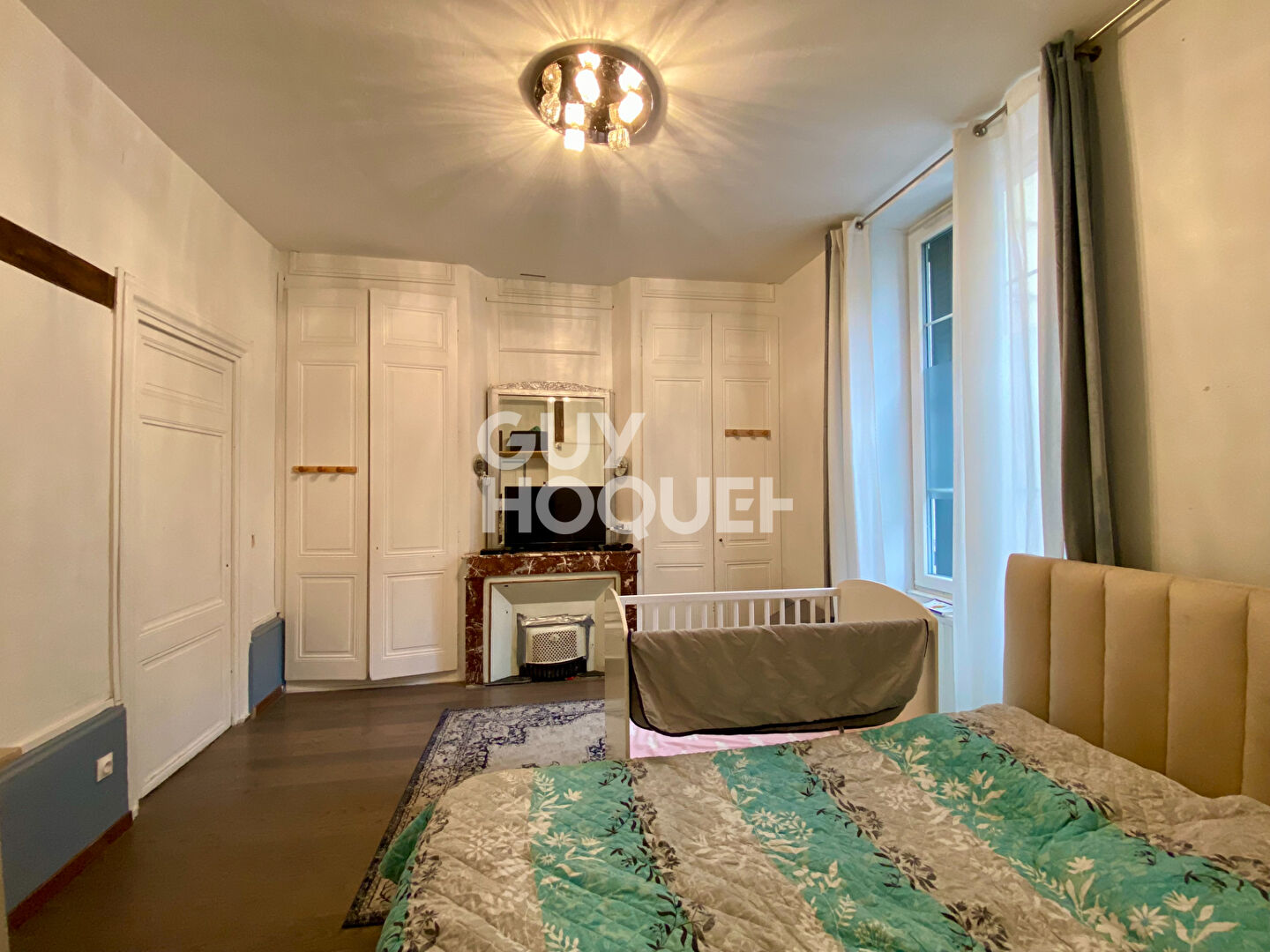 Appartement T4 traversant en rez-de-chaussée avec grande terrasse dans le centre-ville de Givors