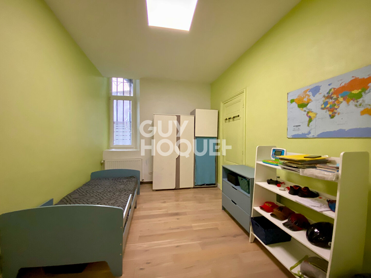 Appartement T4 traversant en rez-de-chaussée avec grande terrasse dans le centre-ville de Givors