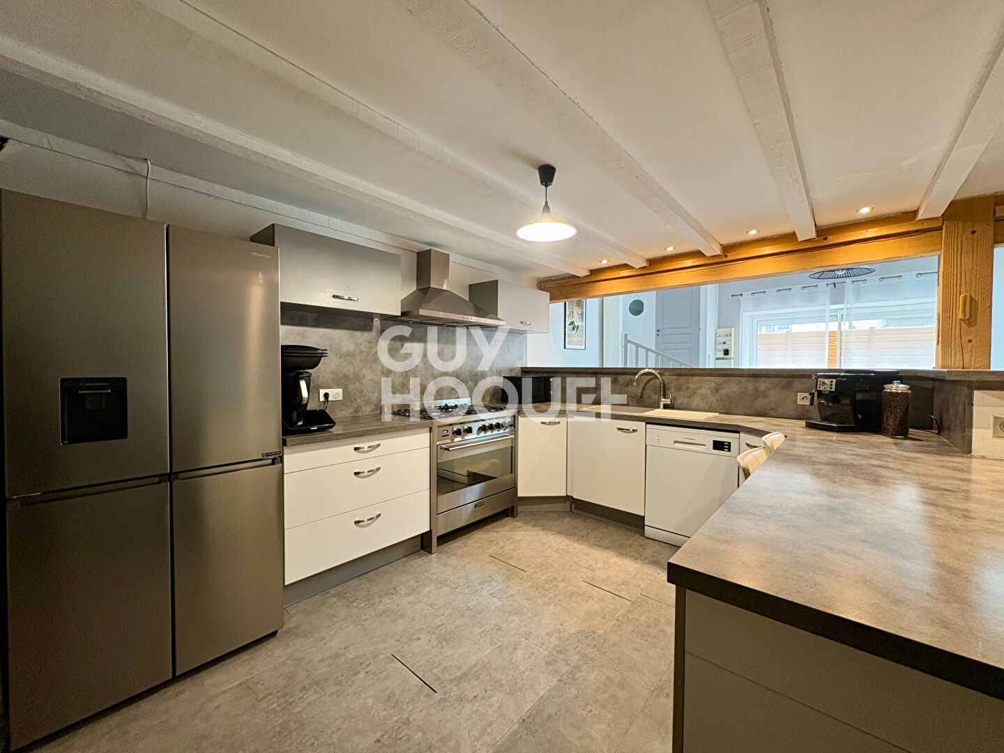 Appartement esprit loft T4 avec terrasse et garage double - coeur de ville