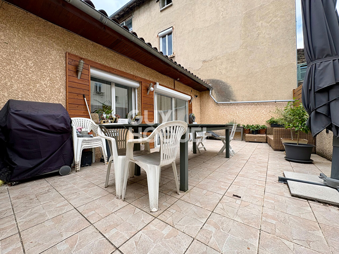 Appartement esprit loft T4 avec terrasse et garage double - coeur de ville