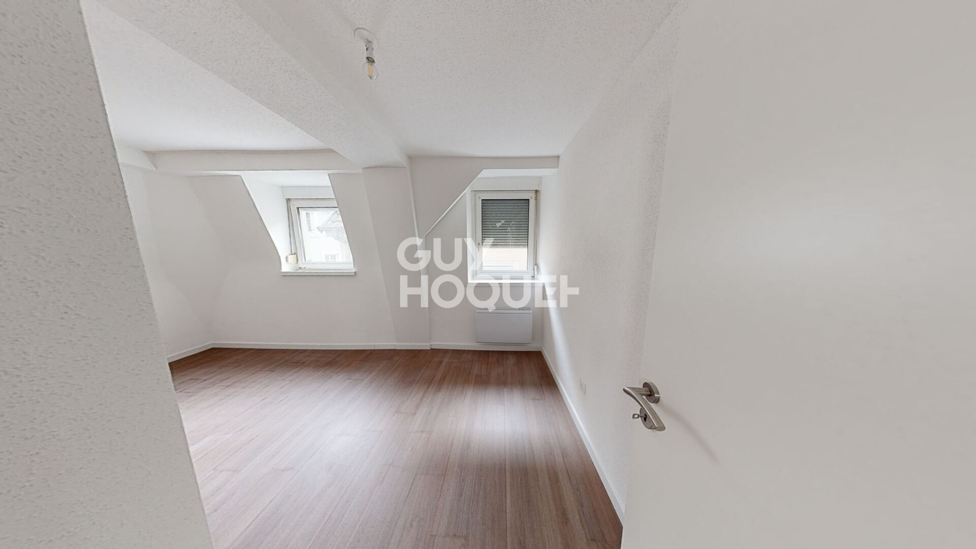 LOCATION d'un appartement F3 (69 m²) à Mulhouse Centre Historique