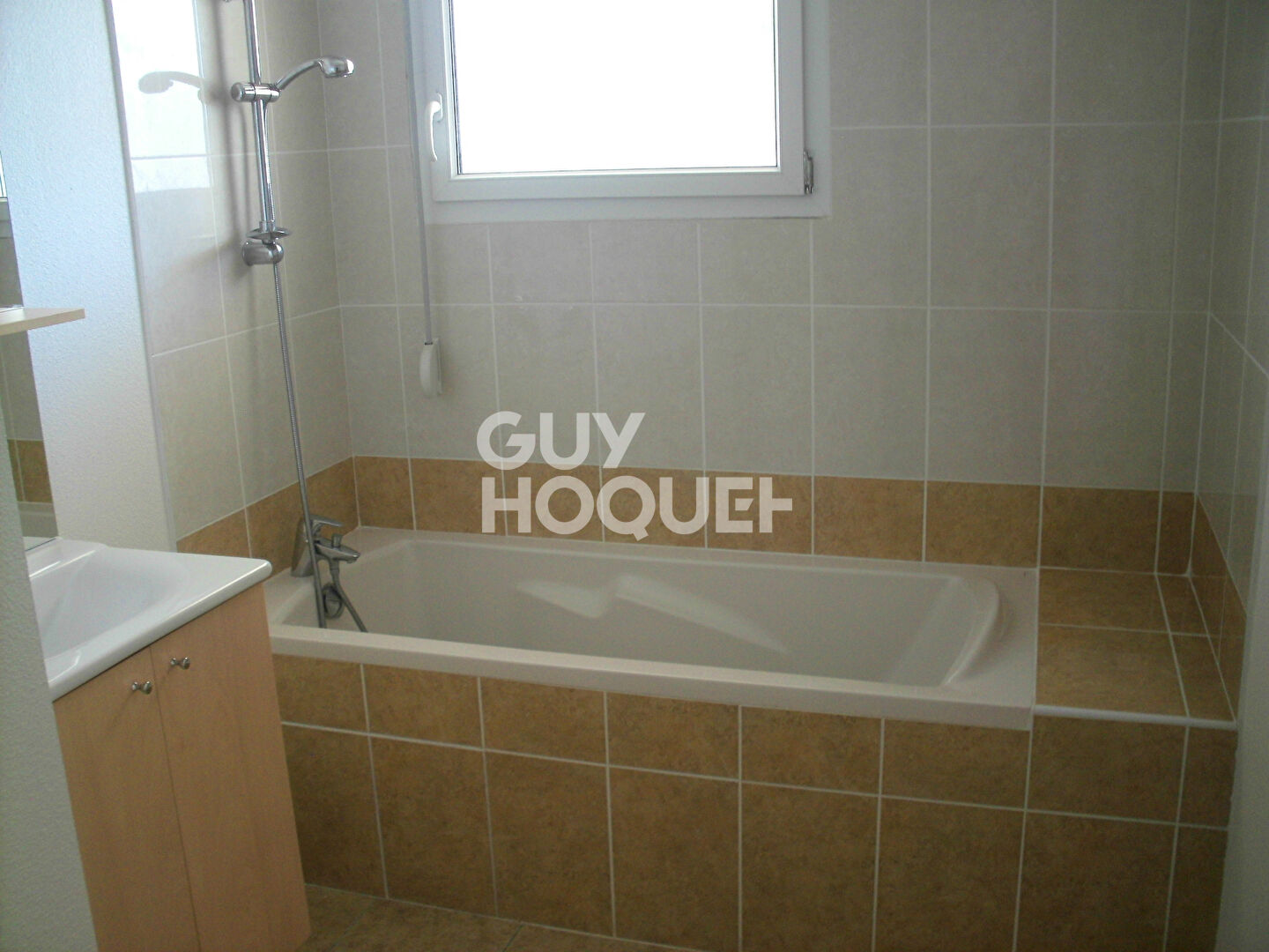 3 pièces de 60.50m²  en rez de jardin