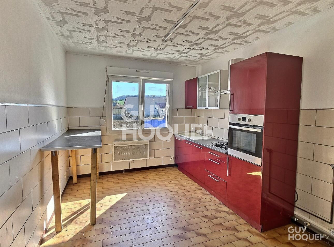 Ensemble immobilier : Deux maisons + garages 179 000 
