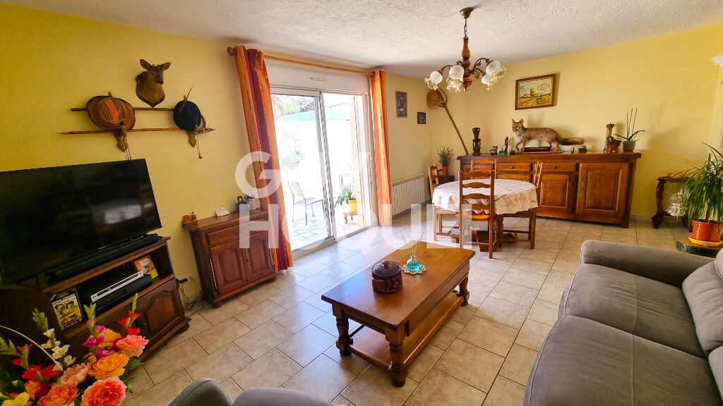 Vente : maison 5 pièces en plain pied  de 90m² sur 4 faces à MARCORIGNAN