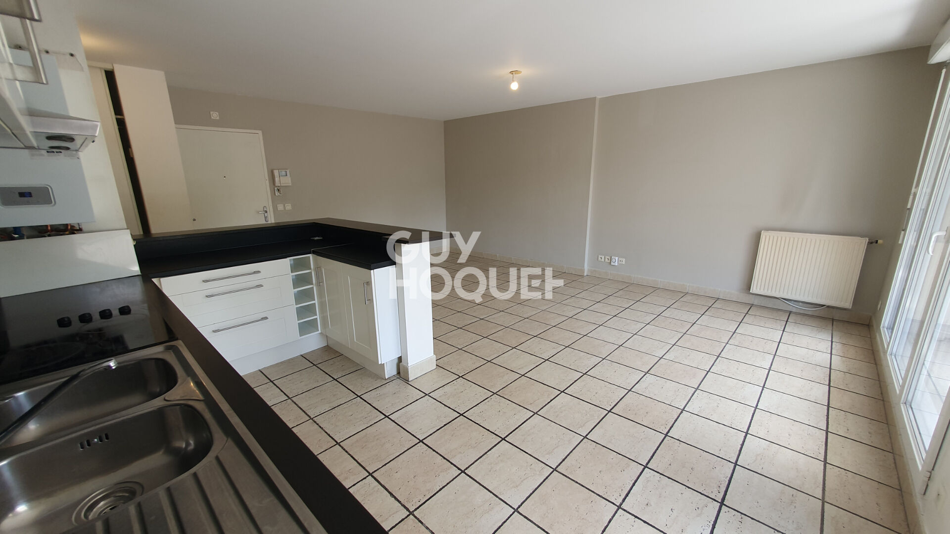 Appartement F3 (65 m²) à vendre à OULLINS - Résidence Calme . Balcon et Garage