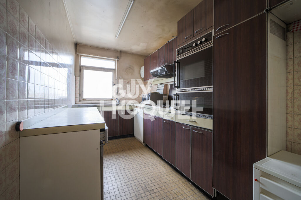 Appartement Paris 4 pièce(s) 77.36 m2