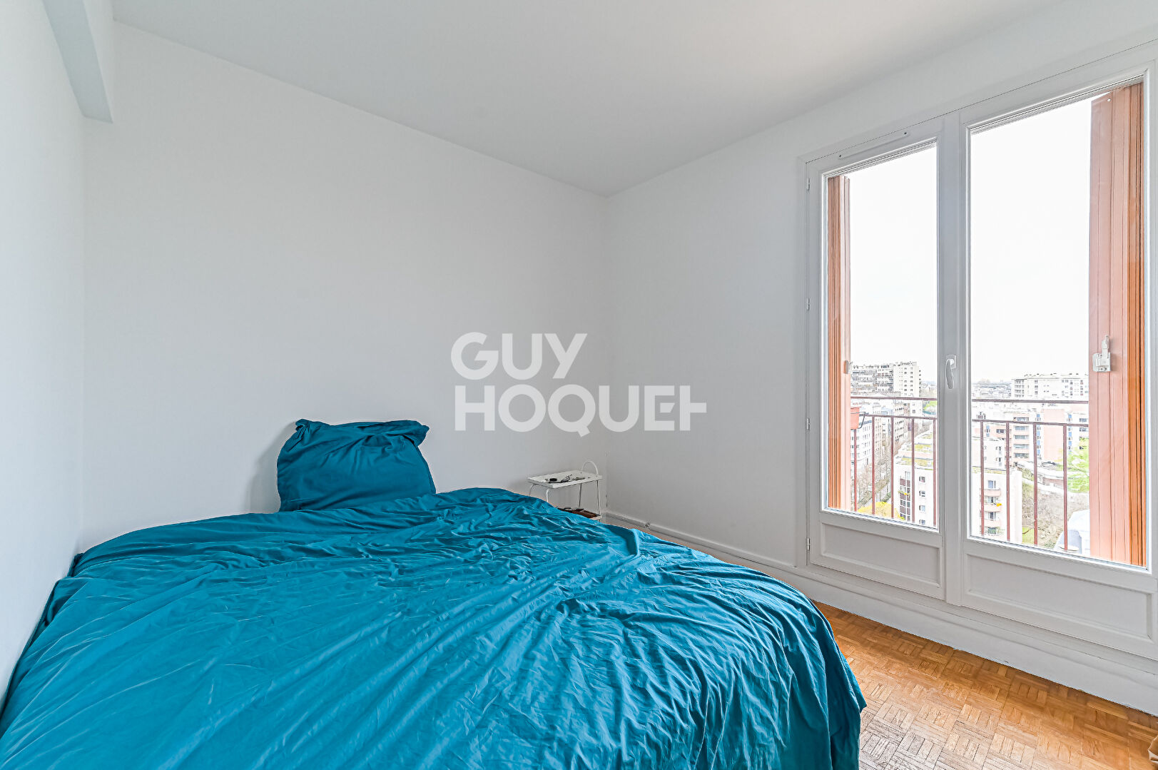 Trois pièces en étage très élevé - Vue dégagée - Lumineux et paisible