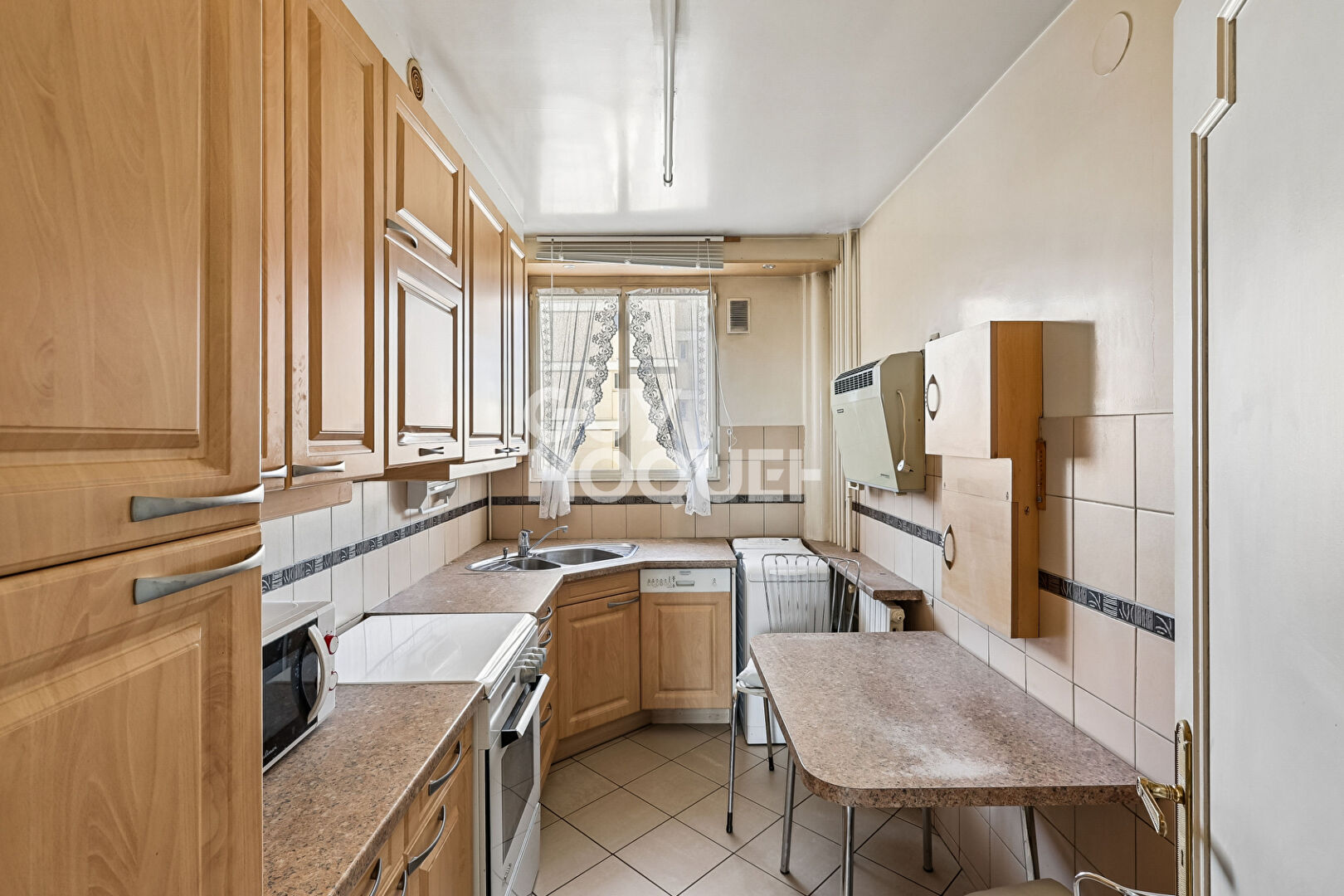 Rue de la Justice T4 81m² traversant, balcon