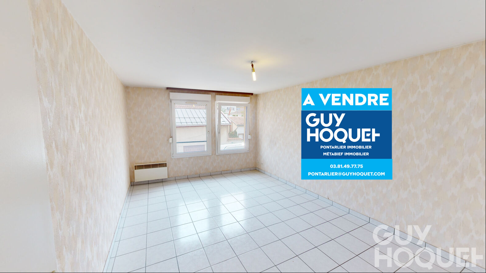 Vente : APPARTEMENT 2 CHAMBRES - GARAGE - CENTRE-VILLE